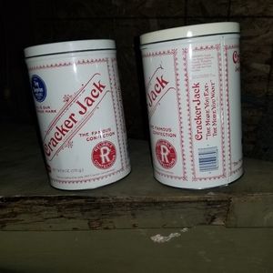 I have 2 vintage cracker Jack tins